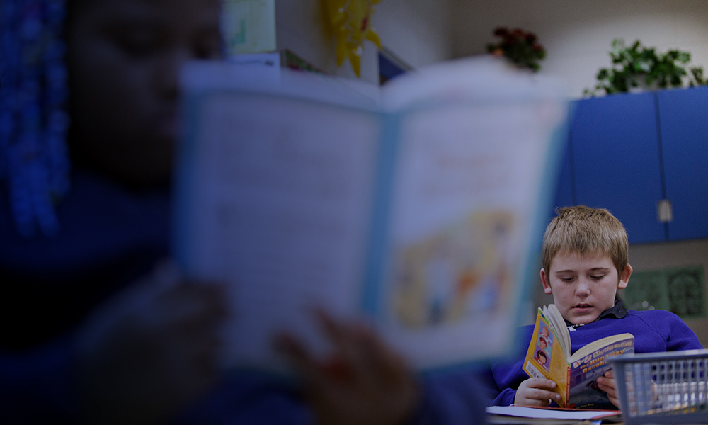 Two Students reading books