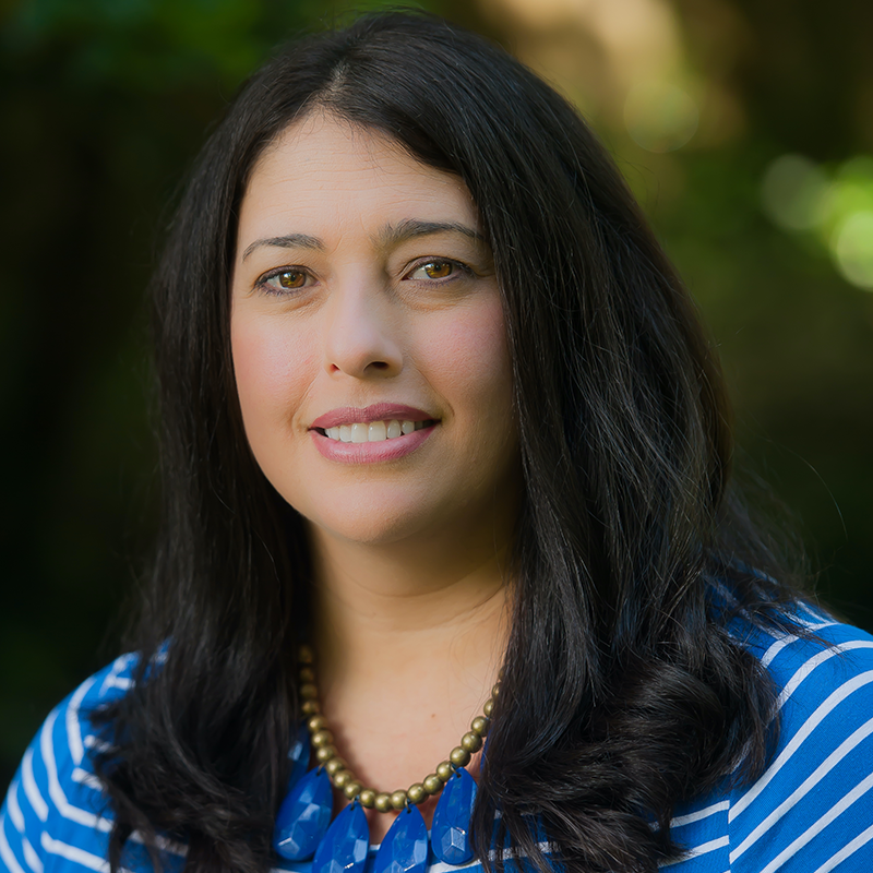 A headshot of Michele Watson