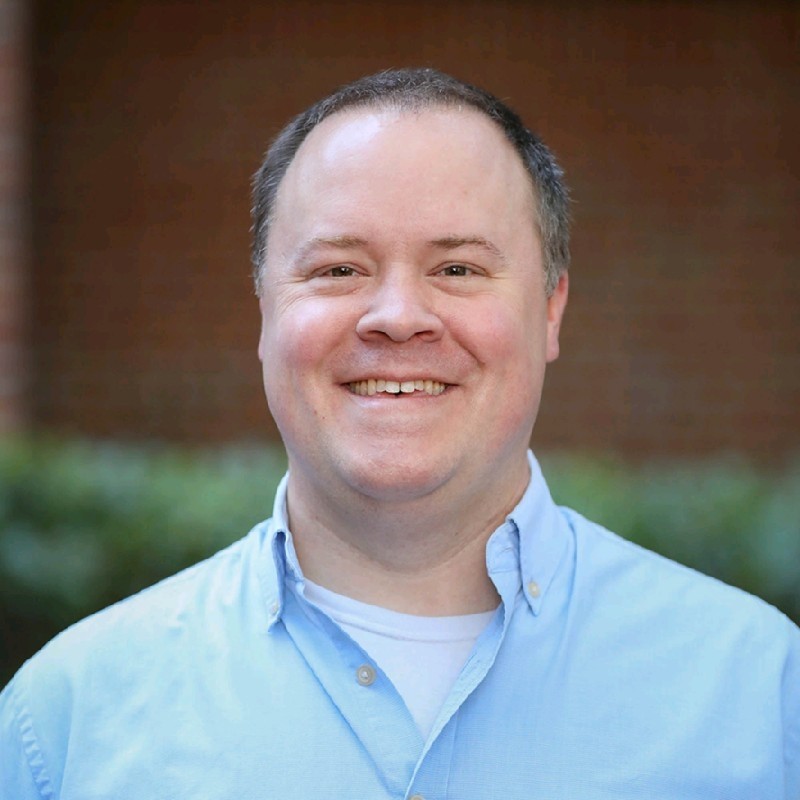 A headshot of Christopher Engledowl