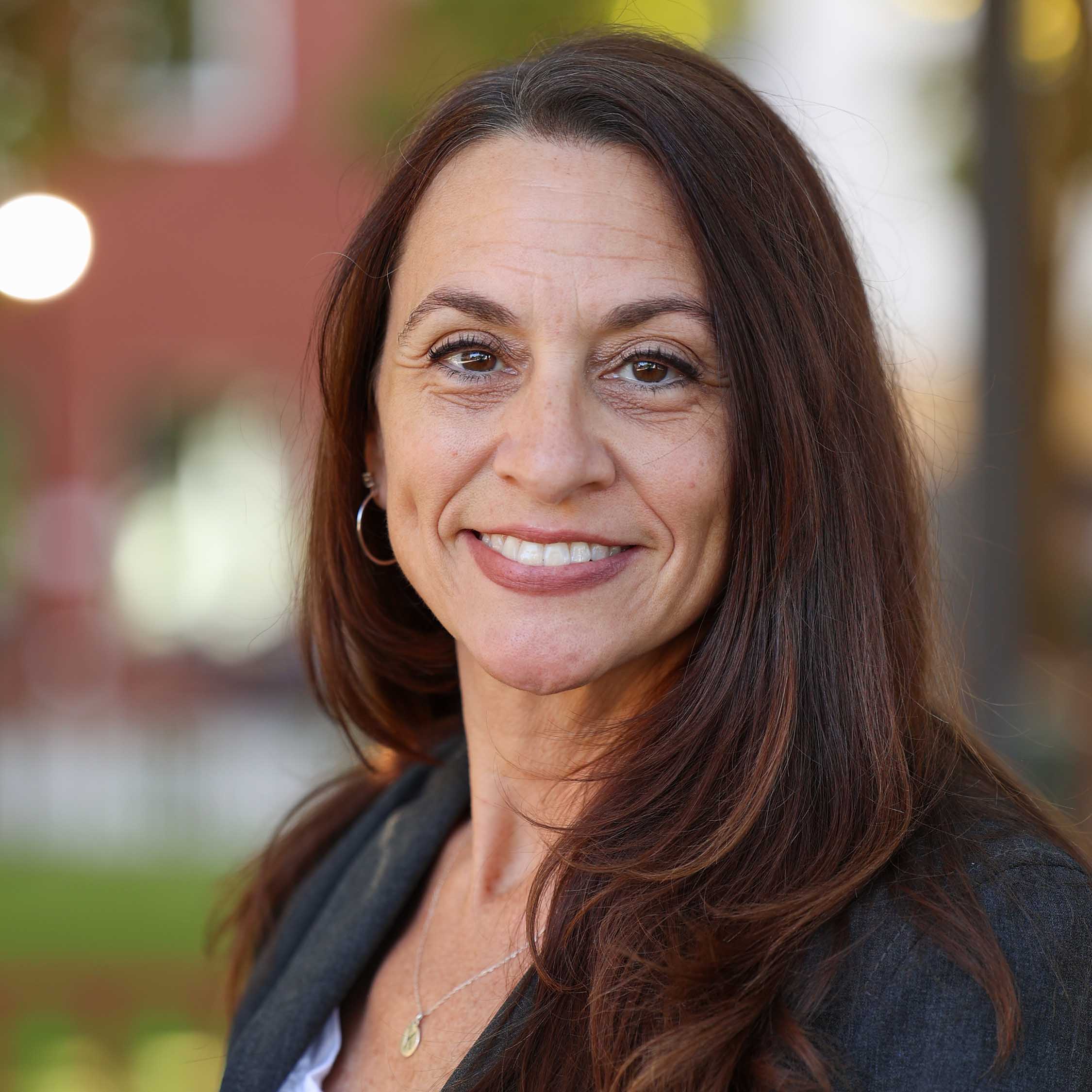 A headshot of Eva Andrade