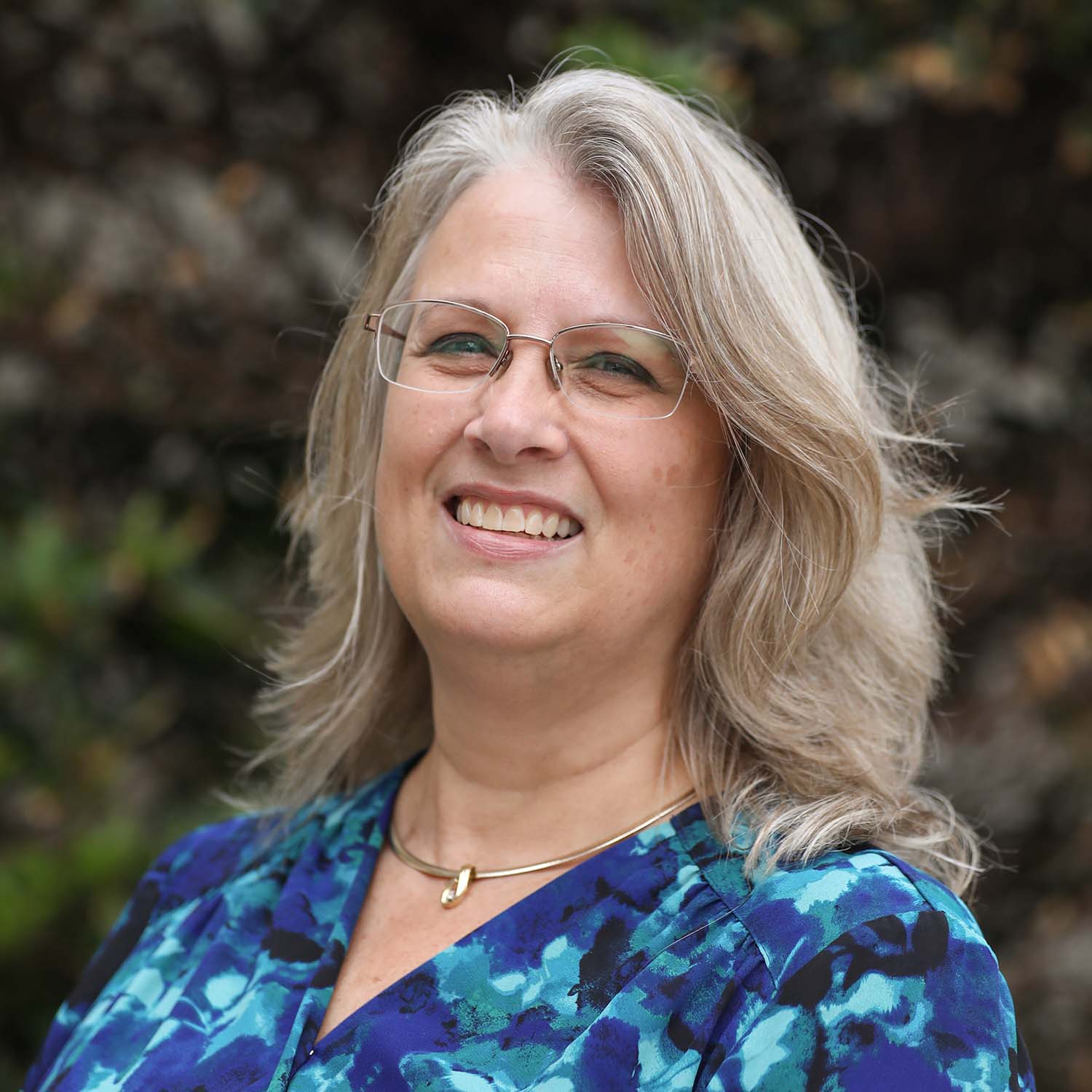 A headshot of Whitney Augustine