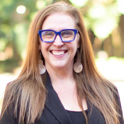 Kristi Cheyney-Collante, Ph.D. Phil Poekert headshot